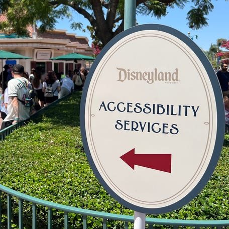 Disneyland guests can register for its Disability Access Service and learn about other accommodations online or in-person outside the parks.