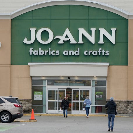 Shoppers enter and exit the Joann fabrics and crafts store on Darrow Road near the Joann Headquarters in Hudson on Thursday, Feb. 13, 2025 in Hudson.