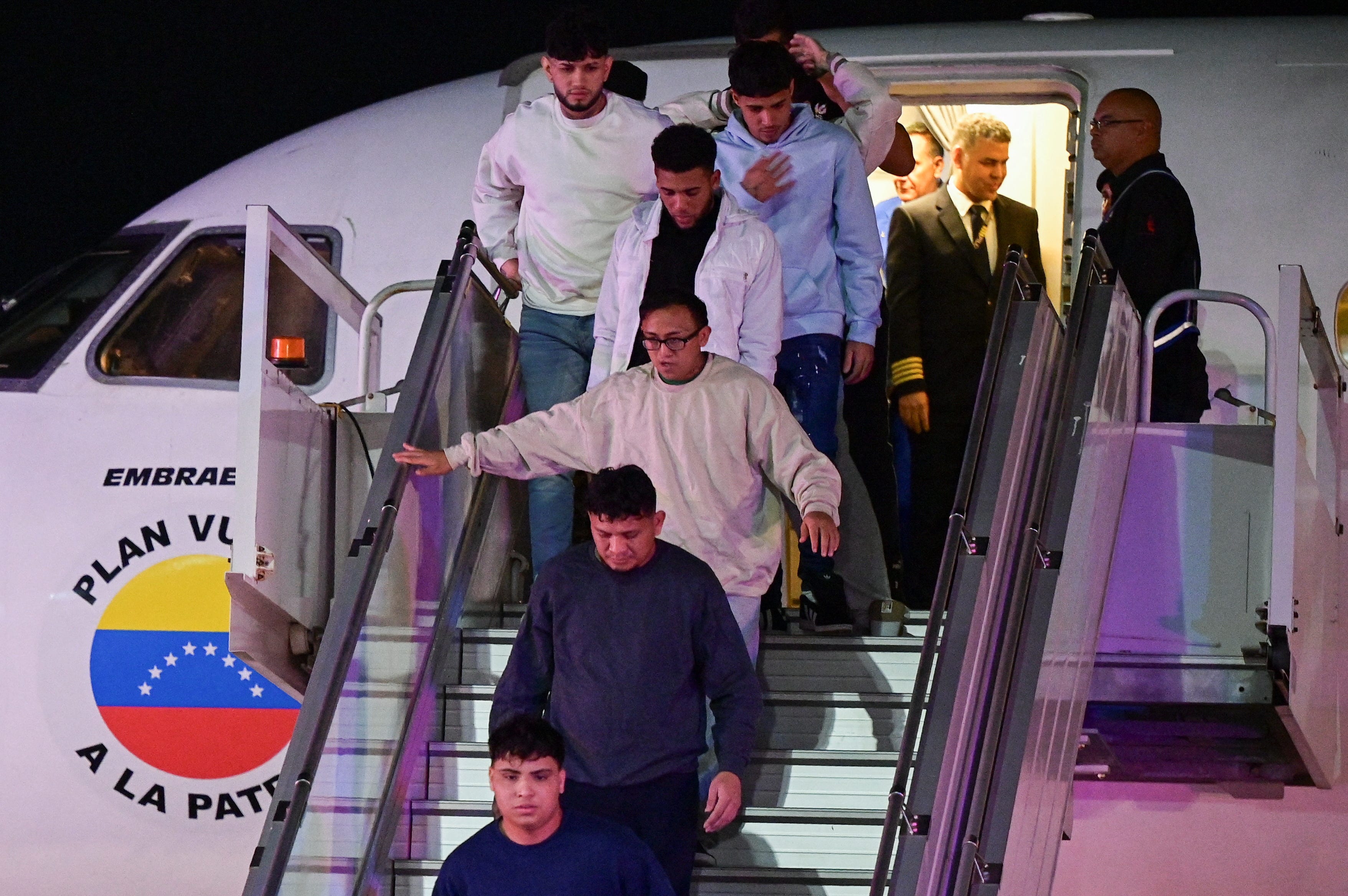 Venezuelan migrants arrive on a deportation flight from the U.S. at the Simon Bolivar International airport in Maiquetia, La Guaira State, Venezuela on February 10, 2025