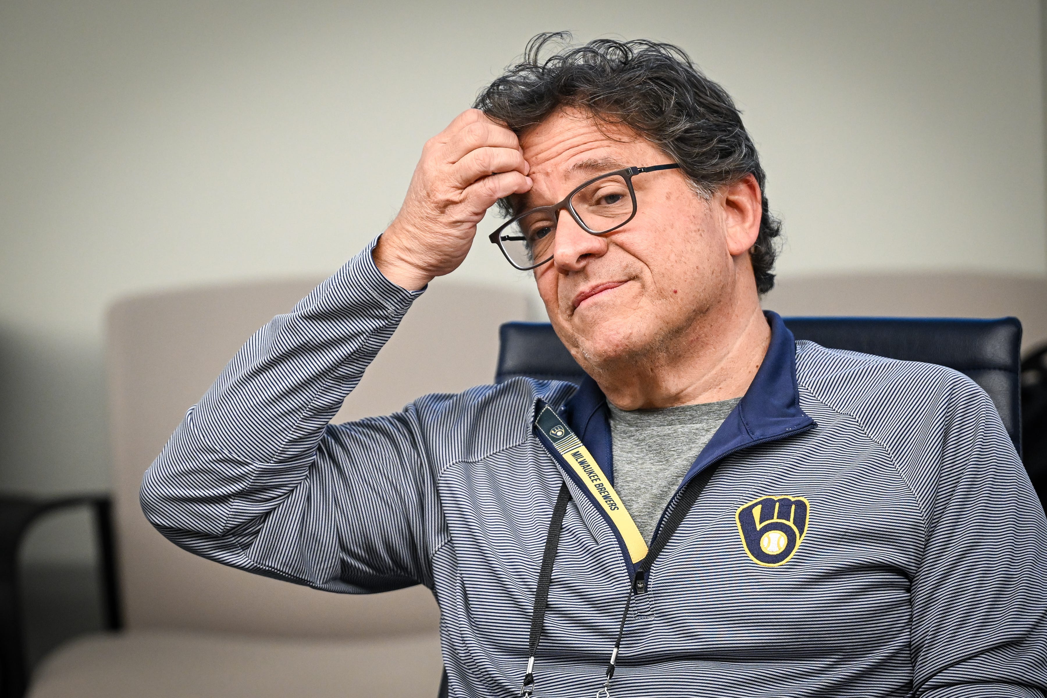 Milwaukee Brewers owner Mark Attanasio speaks with reporters.