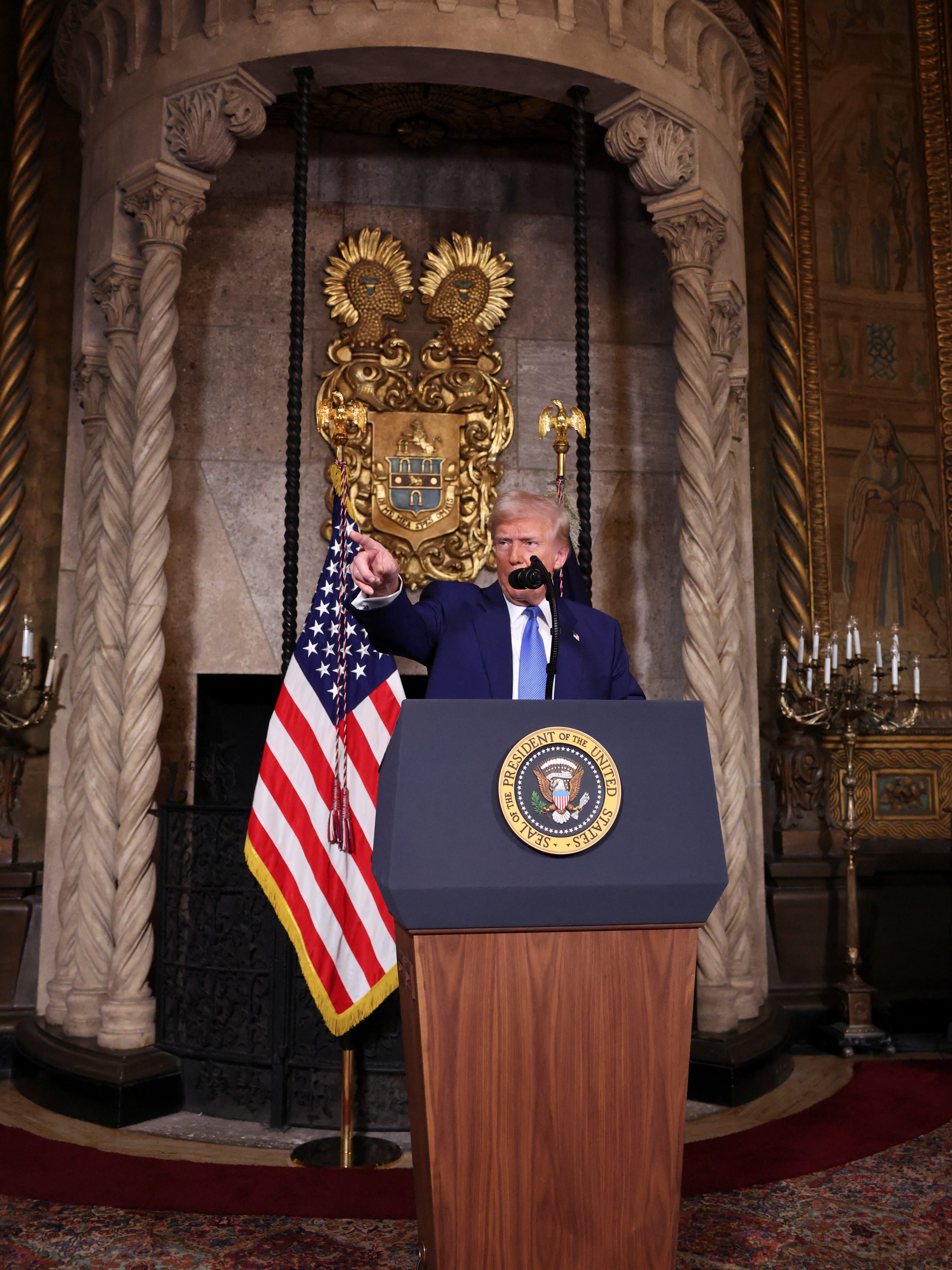 U.S. President Donald Trump points as he speaks at Mar-a-Lago in Palm Beach, Florida, U.S., February 18, 2025. REUTERS/Kevin Lamarque