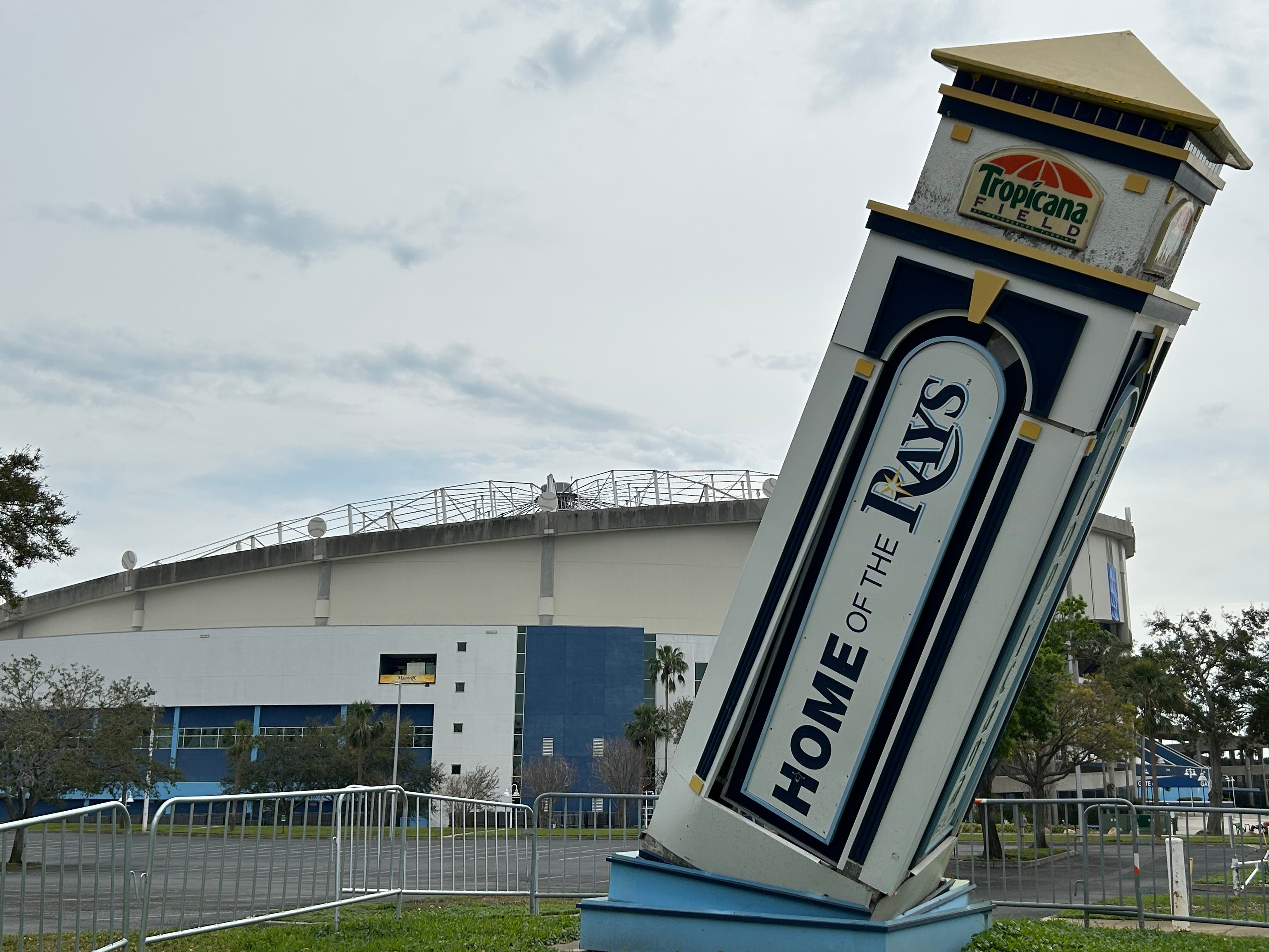A directional sign toppled at the corner of 16th Street and Fifth Avenue South.