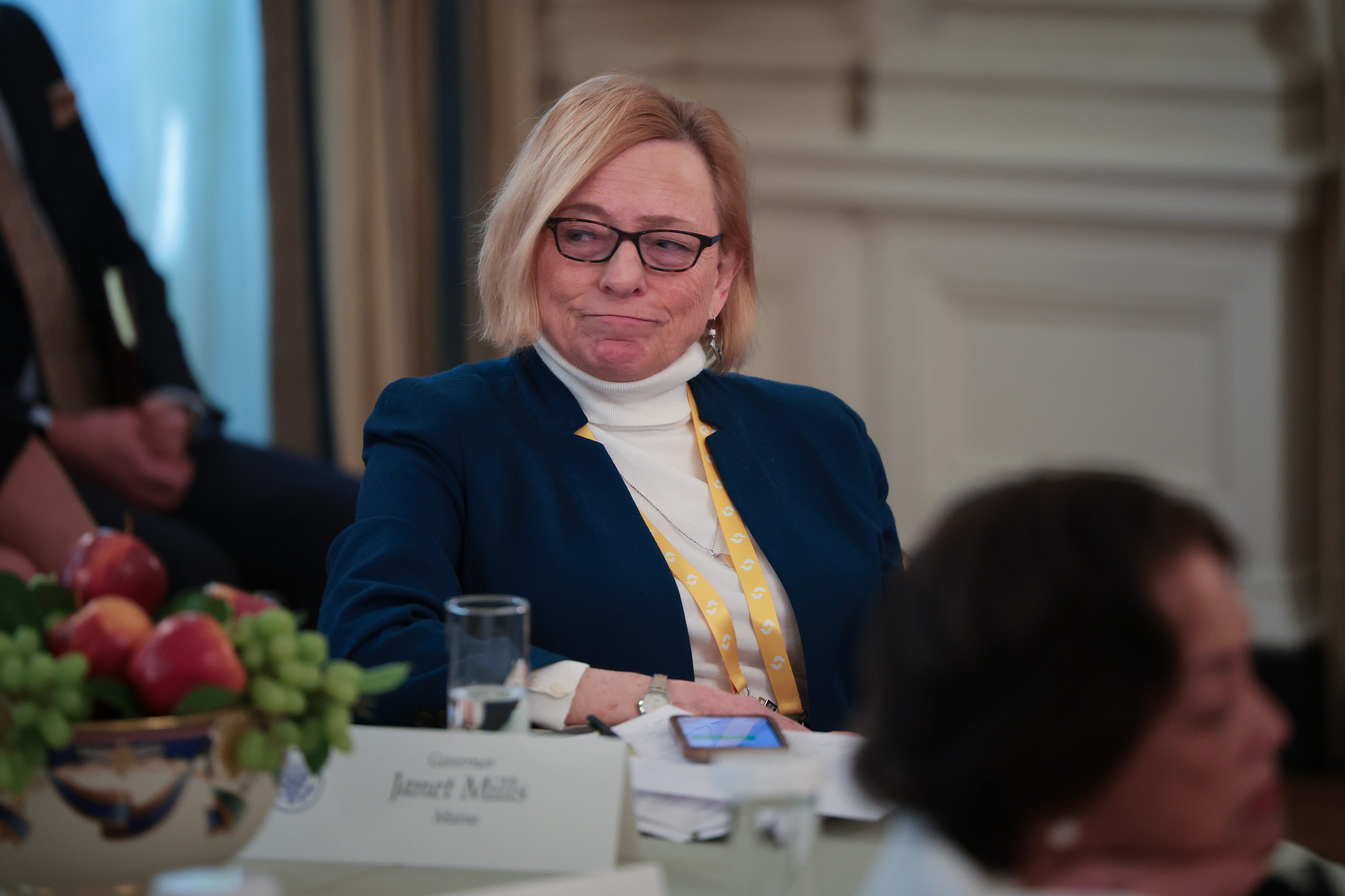 WASHINGTON, DC - FEBRUARY 21: Gov. Janet Mills (D-ME) reacts after challenging U.S. President Donald Trump over federal law on the issue of trans women in sports as Trump addressed a meeting of governors at the White House on February 21, 2025 in Washington, DC. President Trump is hosting a bipartisan group of Governors for a working session at the White House as part The National Governors Association winter meetings. (Photo by Win McNamee/Getty Images)