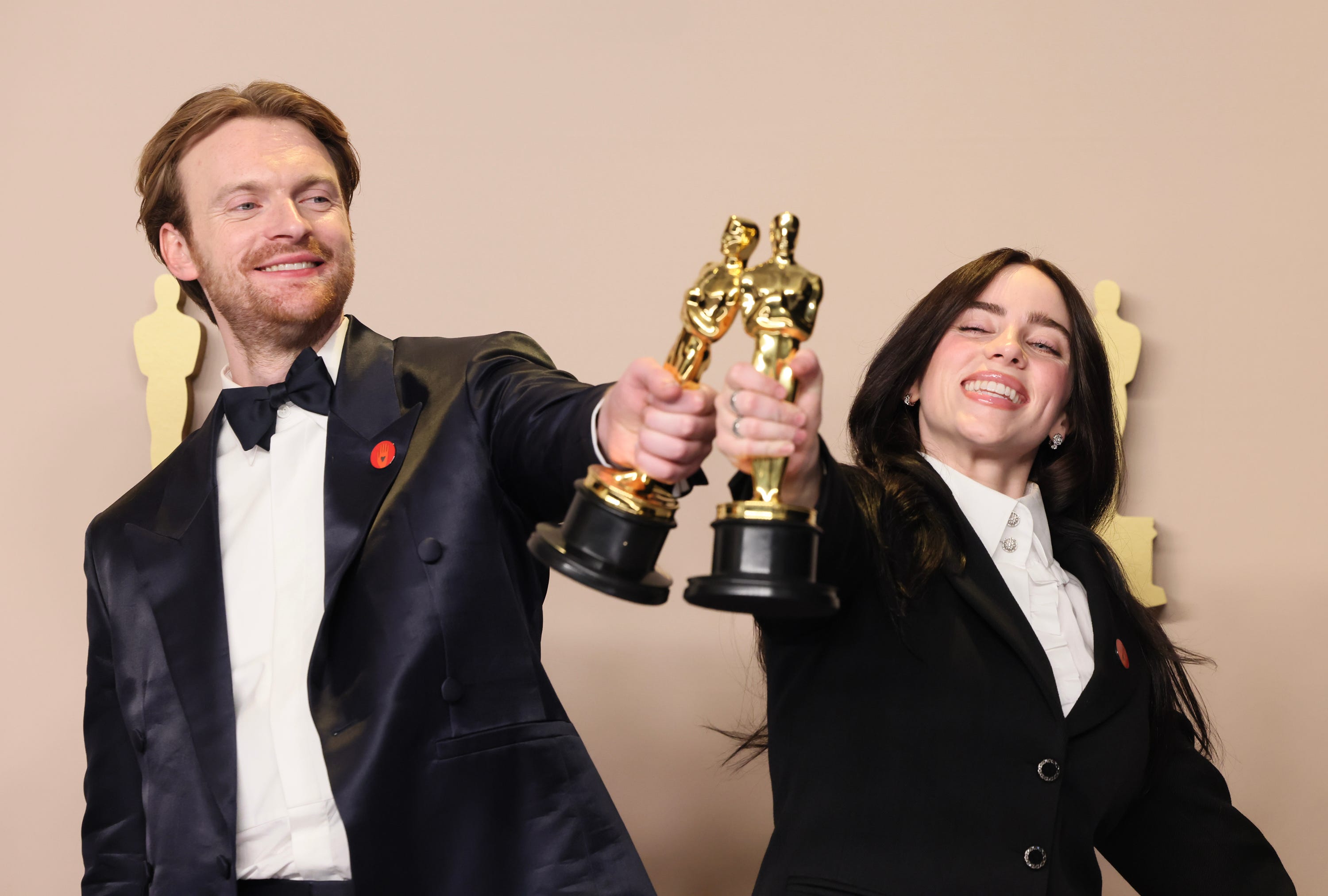Finneas O'Connell and Billie Eilish, winners of Best Original Song award for 'What Was I Made For?' from "Barbie" pose in the press room during the 96th Annual Academy Awards.
