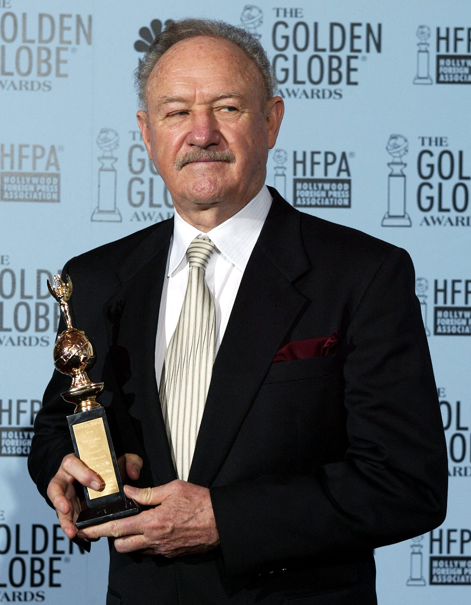 Gene Hackman holds the Cecile B. DeMille Award at the 60th Annual Golden Globe Awards Jan. 19, 2003, in Beverly Hills, California.