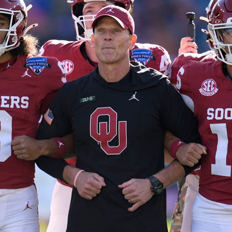 Oklahoma coach Brent Venables stands with his team before their game against Army in the 2024 Armed Forces Bowl at Amon G. Carter Stadium in Fort Worth, Texas.