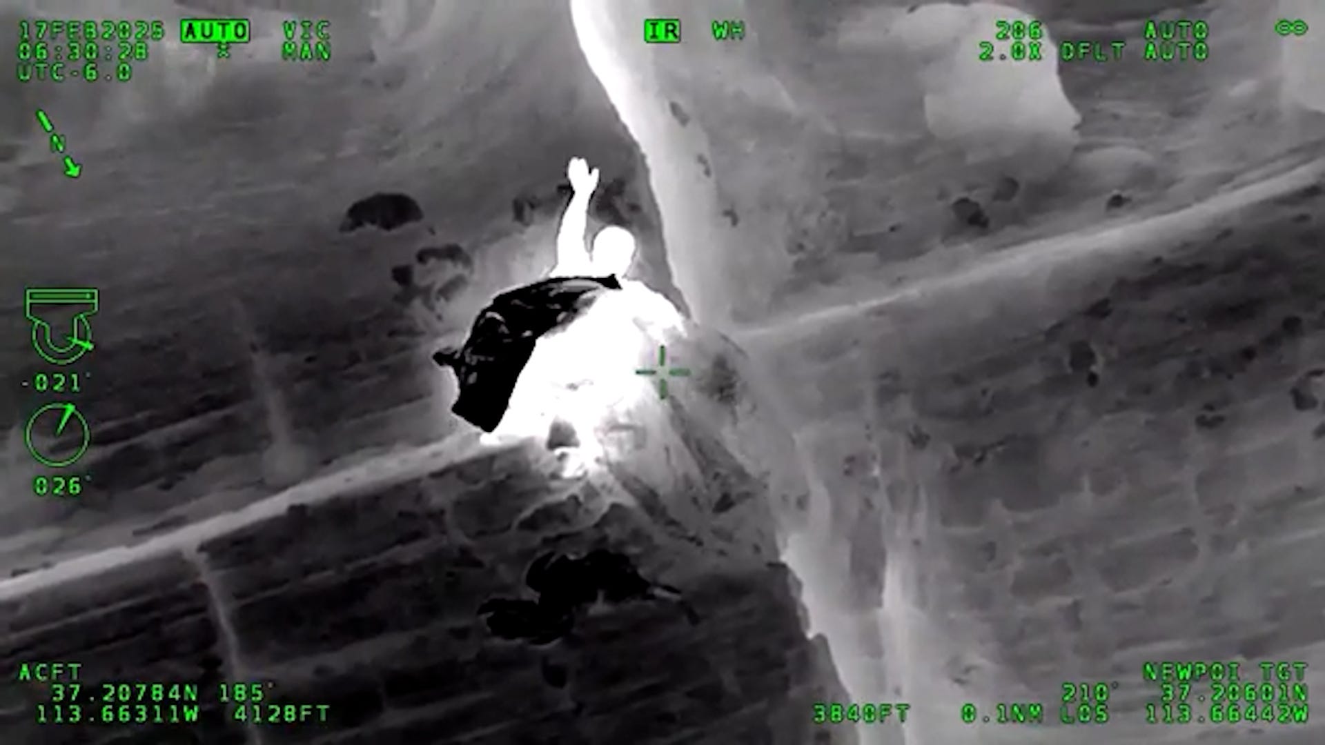 After finding provisions in a discarded backpack, Julian Hernandez and his son survive a night stranded on a cliff in Snow Canyon State Park, Utah.