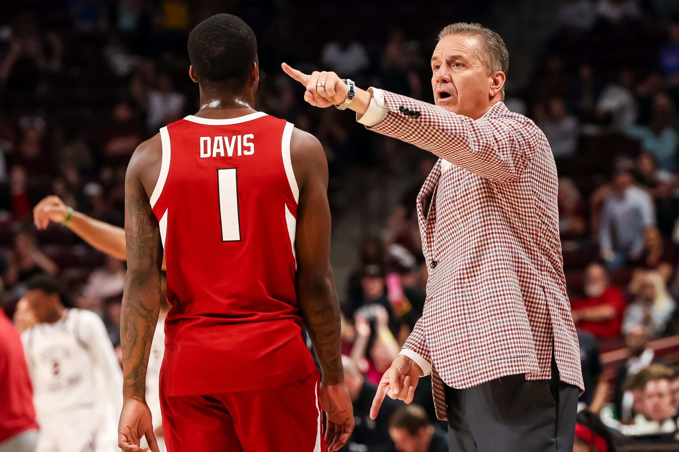Arkansas head coach John Calipari directs his team during the game against South Carolina.