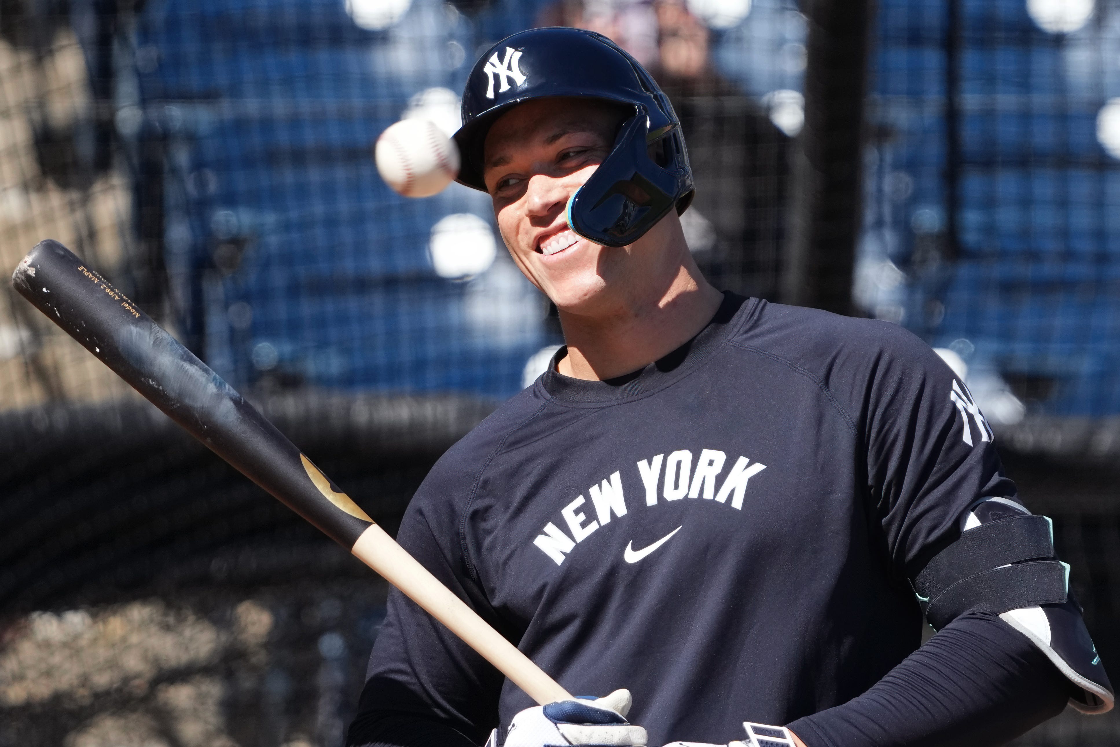 New York Yankees outfielder Aaron Judge smiles during spring training batting practice at George M. Steinbrenner Field.