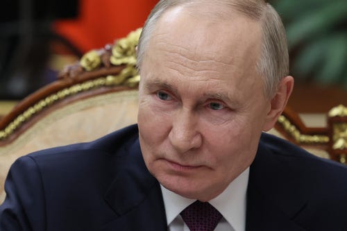 In this pool photograph distributed by Russian state agency Sputnik, Russia's President Vladimir Putin attends a meeting with Head of Republic of Tatarstan in Moscow on March 3, 2025.