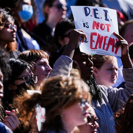 Students chanted and held signs during a rally to protect DEI in America Friday at the University of Louisville campus in Louisville, Kentucky Feb. 28, 2025