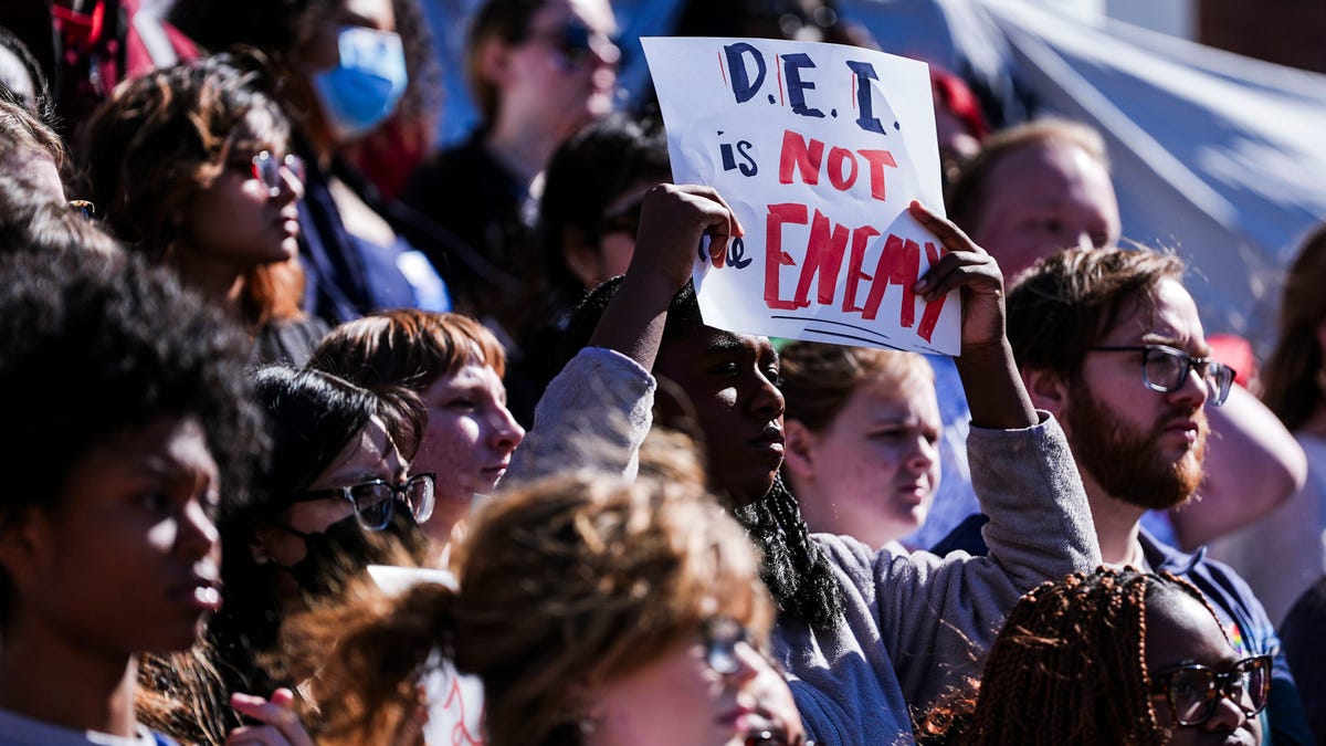 Students chanted and held signs during a rally to protect DEI in America Friday at the University of Louisville campus in Louisville, Kentucky Feb. 28, 2025