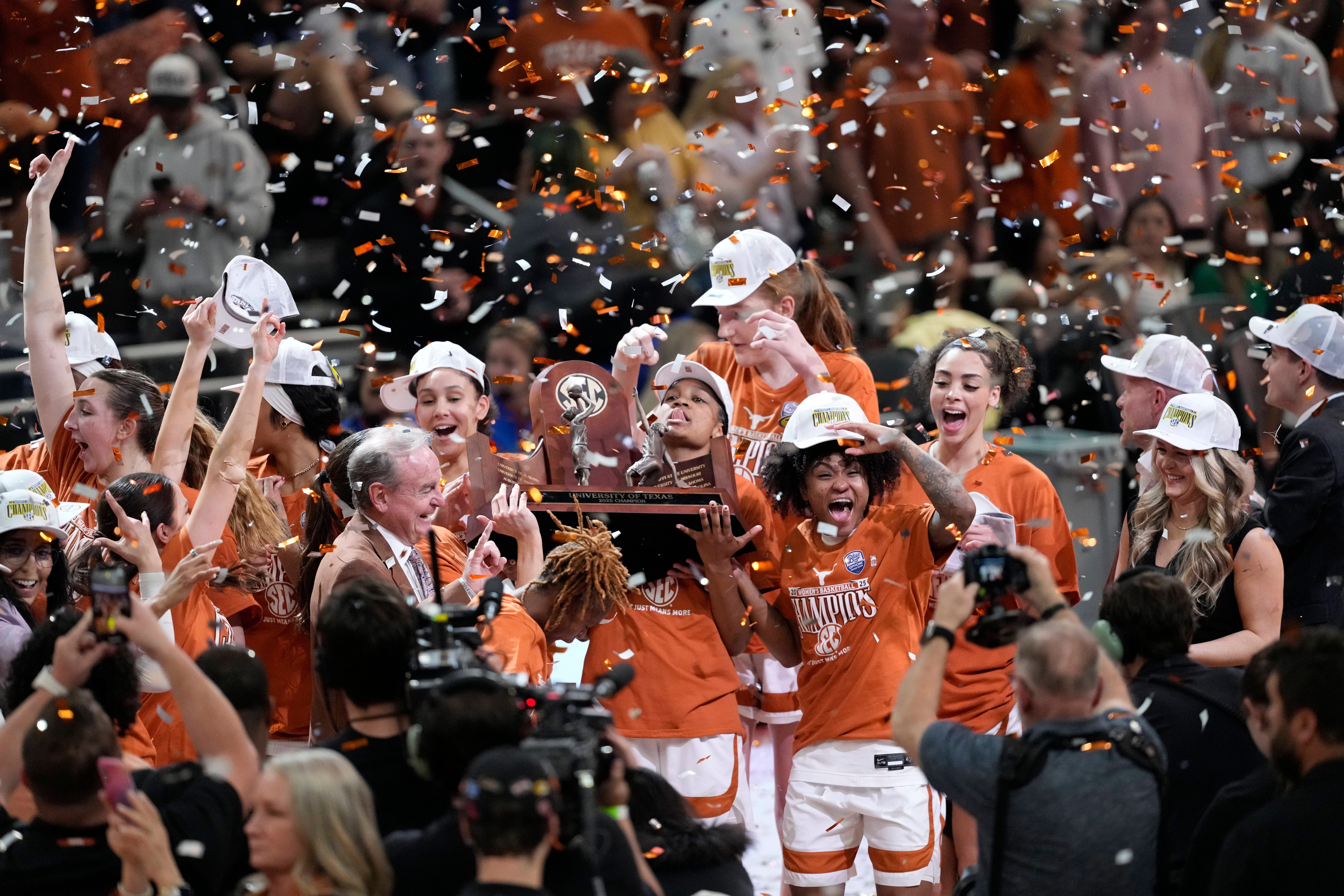 The Texas Longhorns celebrate being co-SEC regular-season champions after their victory over the Florida Gators on Sunday, March 2, 2025, at Moody Center. Mandatory Credit: Scott Wachter-Imagn Images