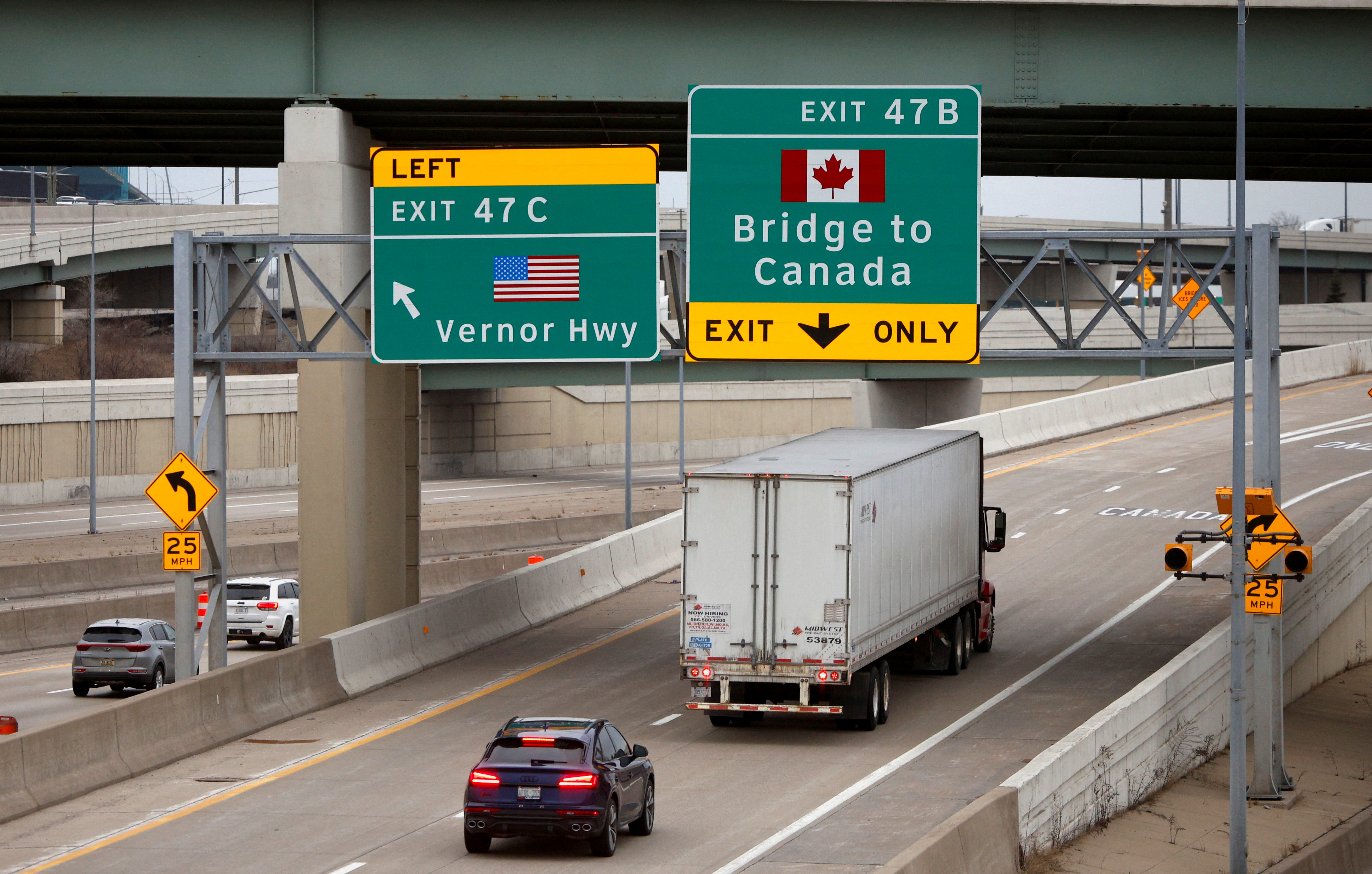 A commercial truck drives towards the Ambassador Bridge to Windsor, Ontario, Canada from Detroit, Michigan. U.S., March 3, 2025.