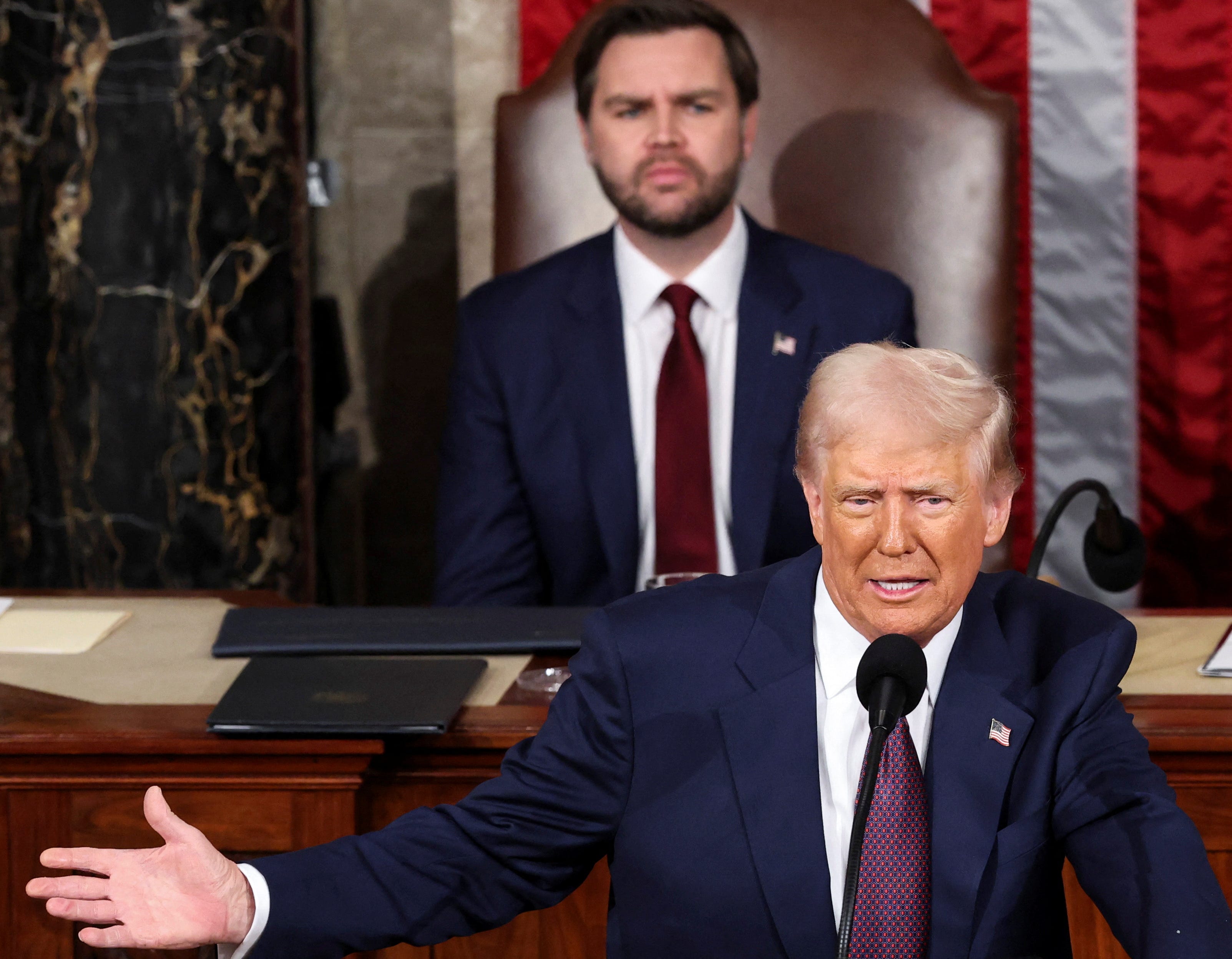 President Donald Trump delivers a speech to a joint session of Congress, as Vice President JD Vance listens in the House chamber of the U.S. Capitol, on March 4, 2025.