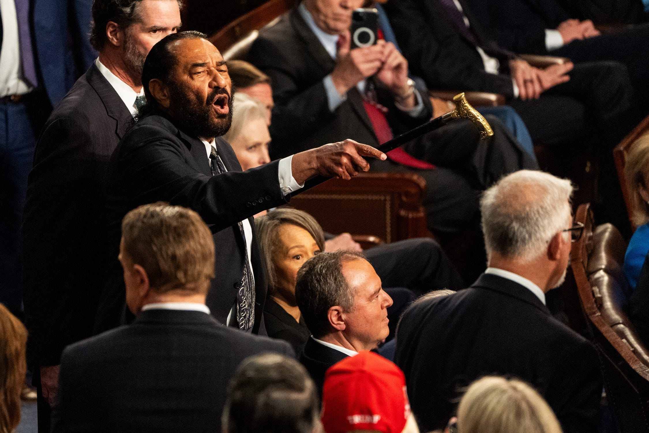 Mar 4, 2025; Washington, DC, USA; Rep. Al Green (D-Texas) is removed from the House chamber for disrupting President Donald Trump as he addresses a joint session of Congress at the U.S. Capitol on Tuesday, March 4, 2025.. Mandatory Credit: Josh Morgan-USA TODAY via Imagn Images