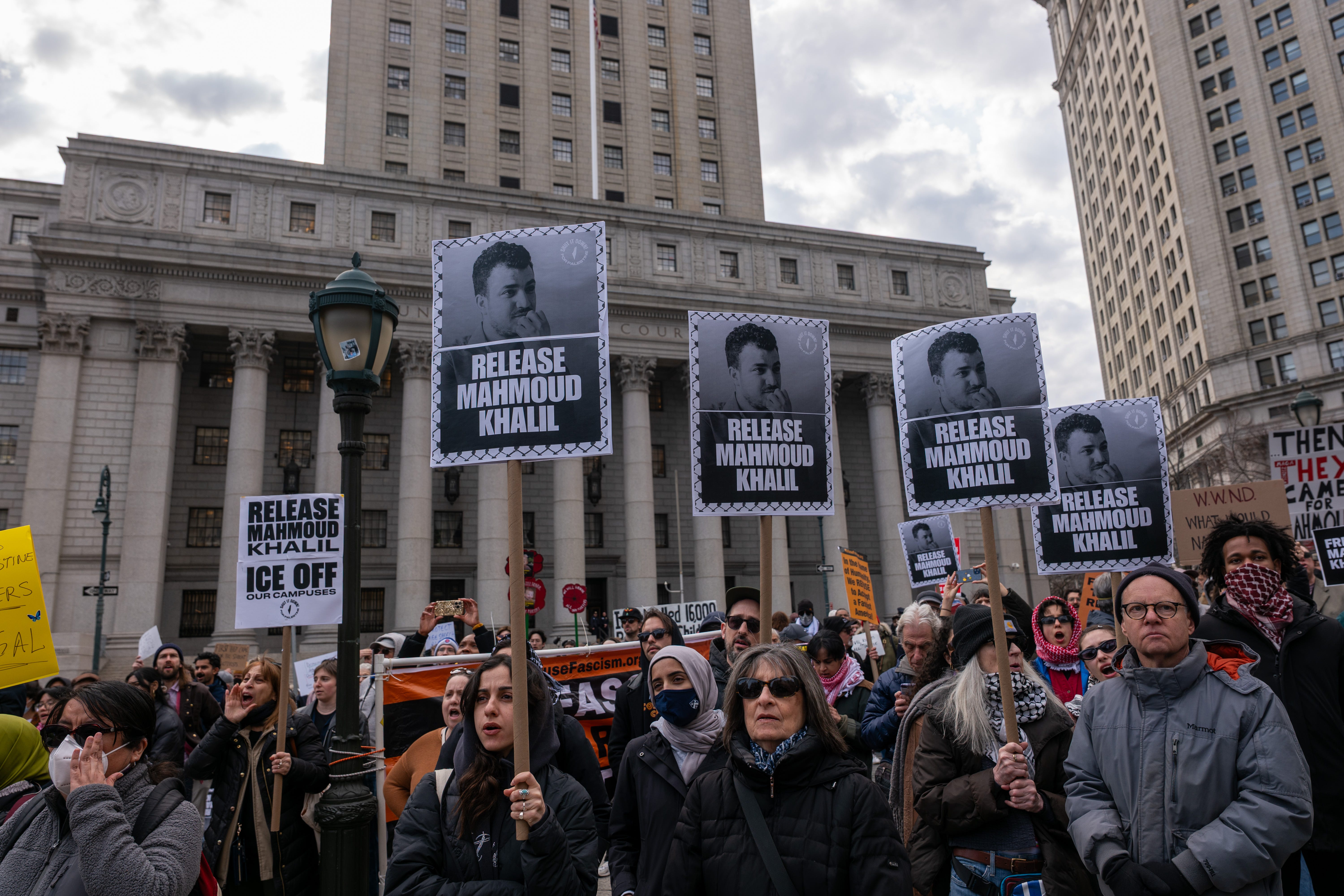 Hundreds turn out outside of a New York City court on March 12, 2025, to protest the arrest and detention of Mahmoud Khalil, a Palestinian activist at Columbia University. Over the weekend, federal immigration agents detained Khalil at his university-owned apartment while returning home with his wife, an American citizen who is pregnant. Officials have not charged Khalil with a crime; he's being held in Louisiana.