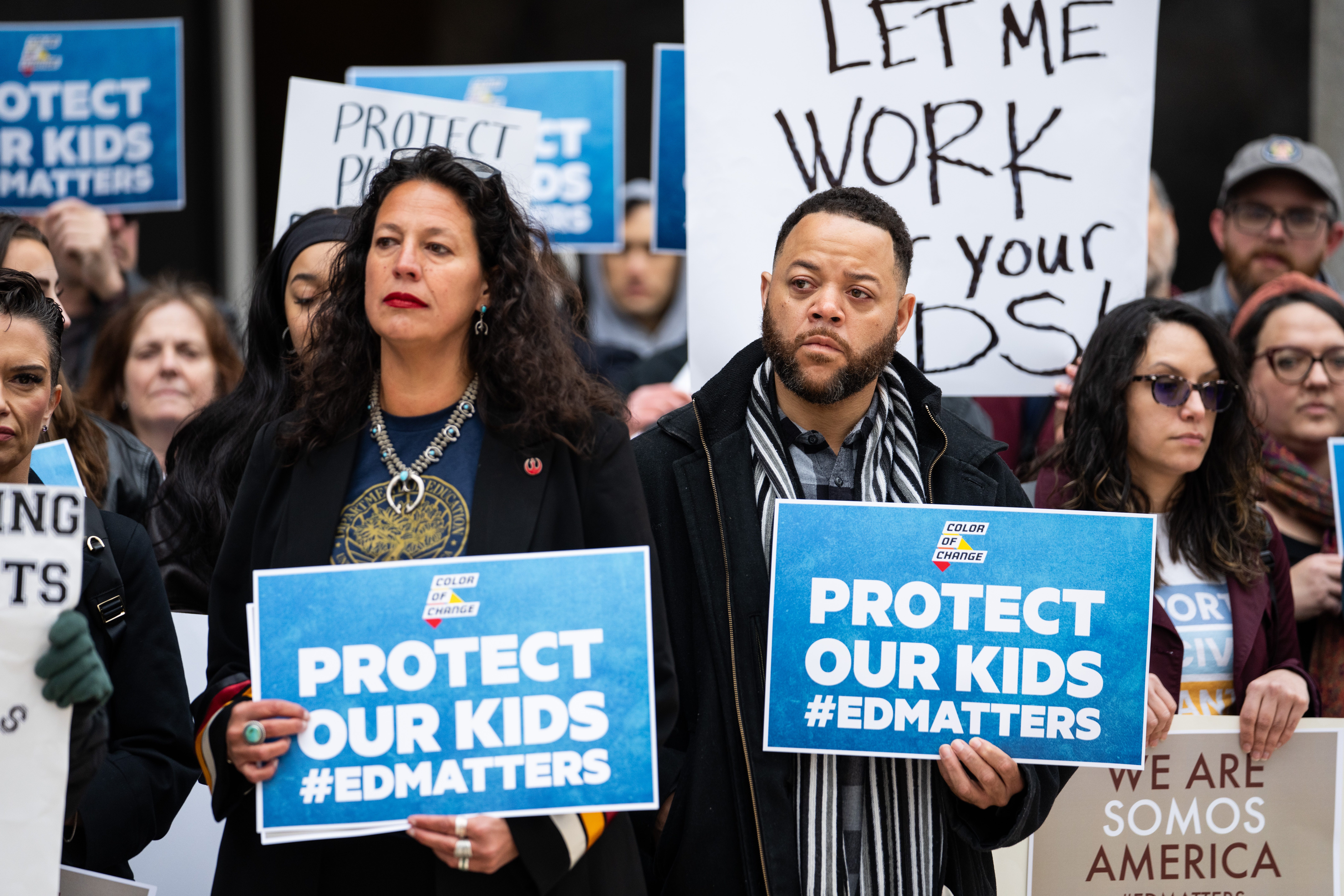 People rally at the U.S. Department of Education on March 14, 2025, after lay-offs and the threat of President Trump closing the agency.