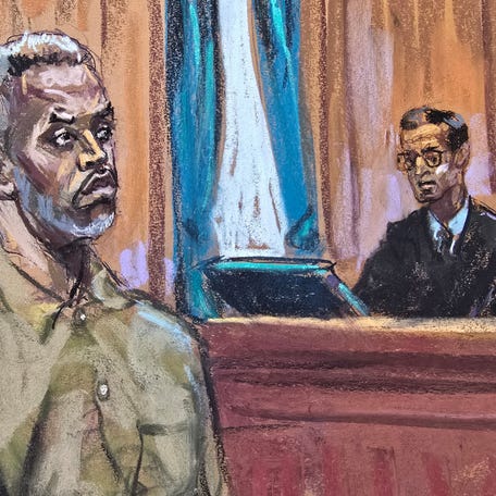 Sean "Diddy" Combs stands as he is arraigned on superseding charges in front of Judge Arun Subramanian in Manhattan federal court on March 14, 2025, in this courtroom sketch.