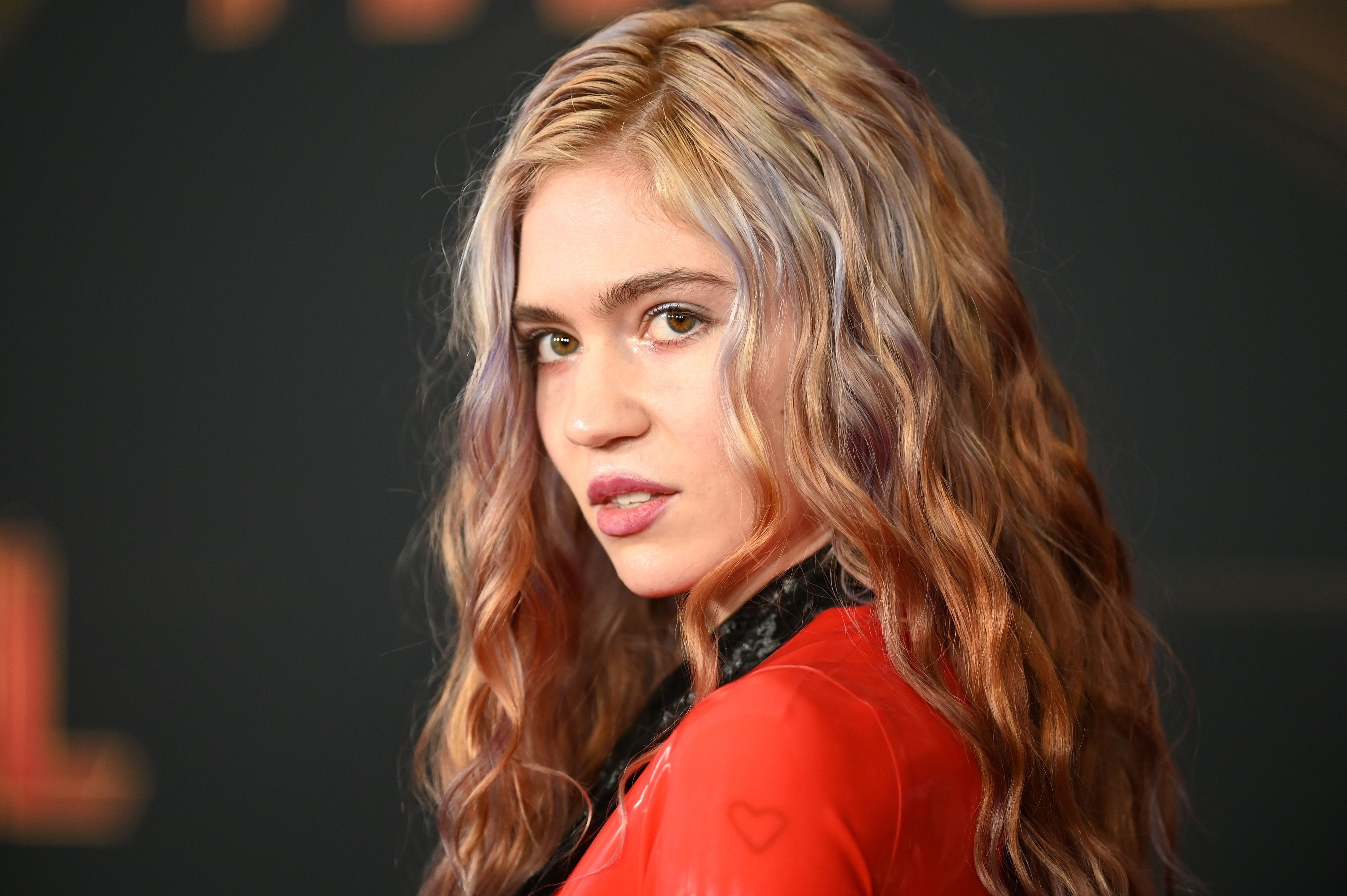 Canadian singer-songwriter Grimes (Claire Elise Boucher) attends the world premiere of "Captain Marvel" in Hollywood, California.