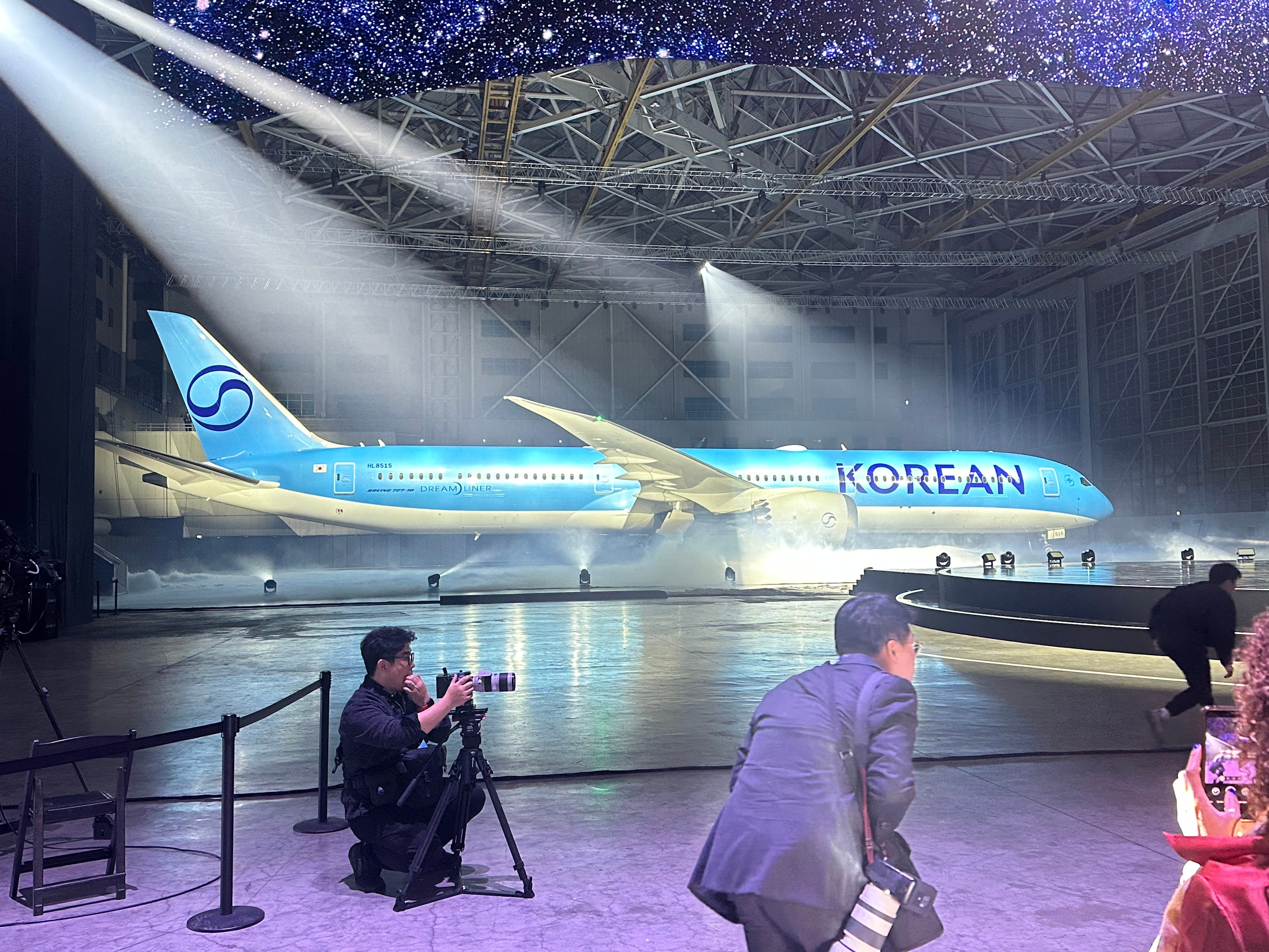 The first plane in Korean Air's new livery at the unveiling event in a hangar in Seoul.