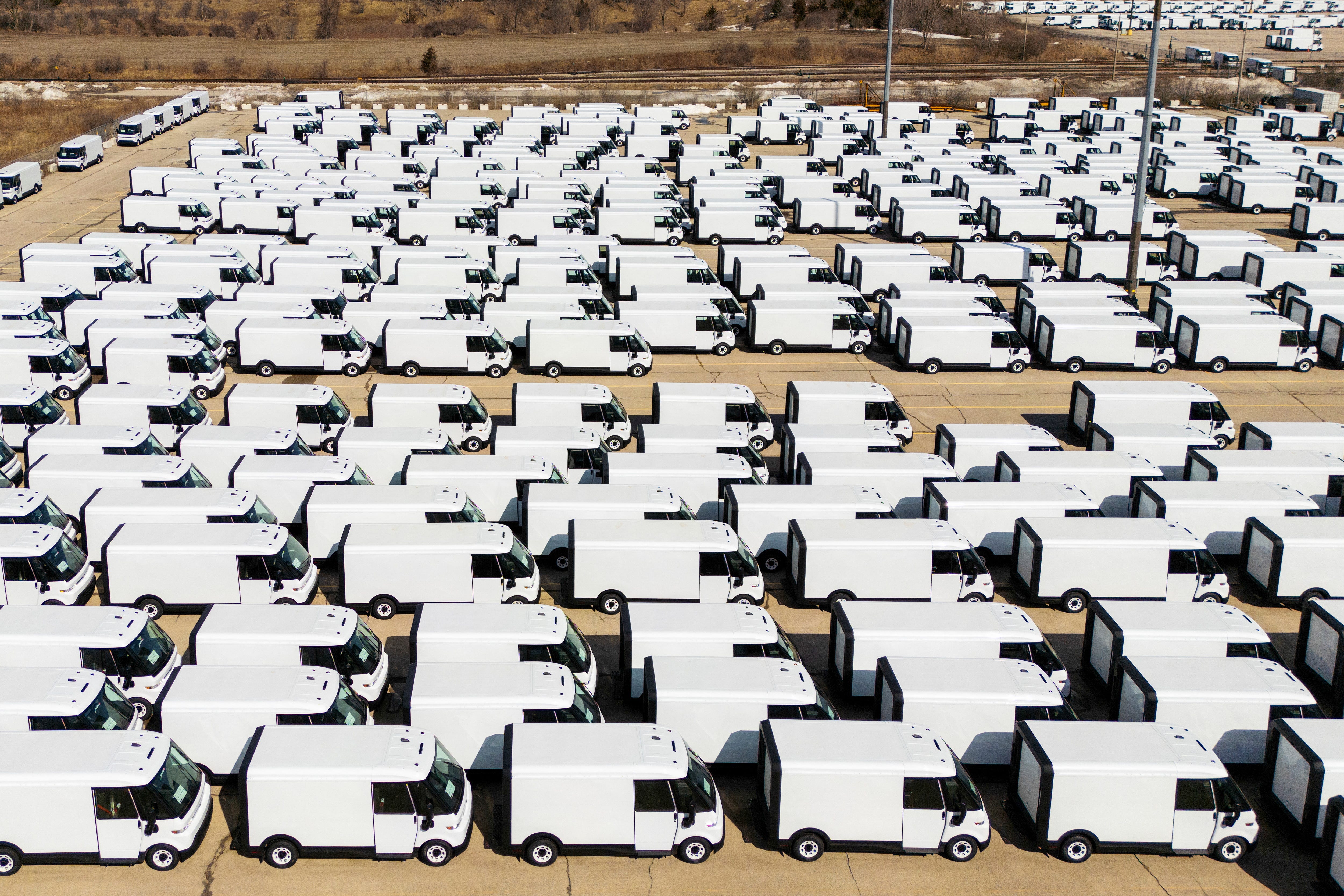 BrightDrop electric delivery vans are parked near General Motors CAMI EV Assembly, Canada's first full-scale electric vehicle manufacturing plant, in Ingersoll, Ontario, Canada, March 13, 2025.