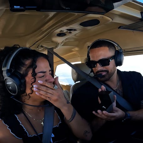 Pilot proposes mid-air to girlfriend who inspired his flying journey