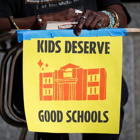 Protestors participate in a "study-in" in front of the U.S. Department of Education on March 21, 2025 in Washington, DC. President Donald Trump signed an executive order yesterday directing Education Secretary Linda McMahon to begin the process of dismantling the Department of Education.