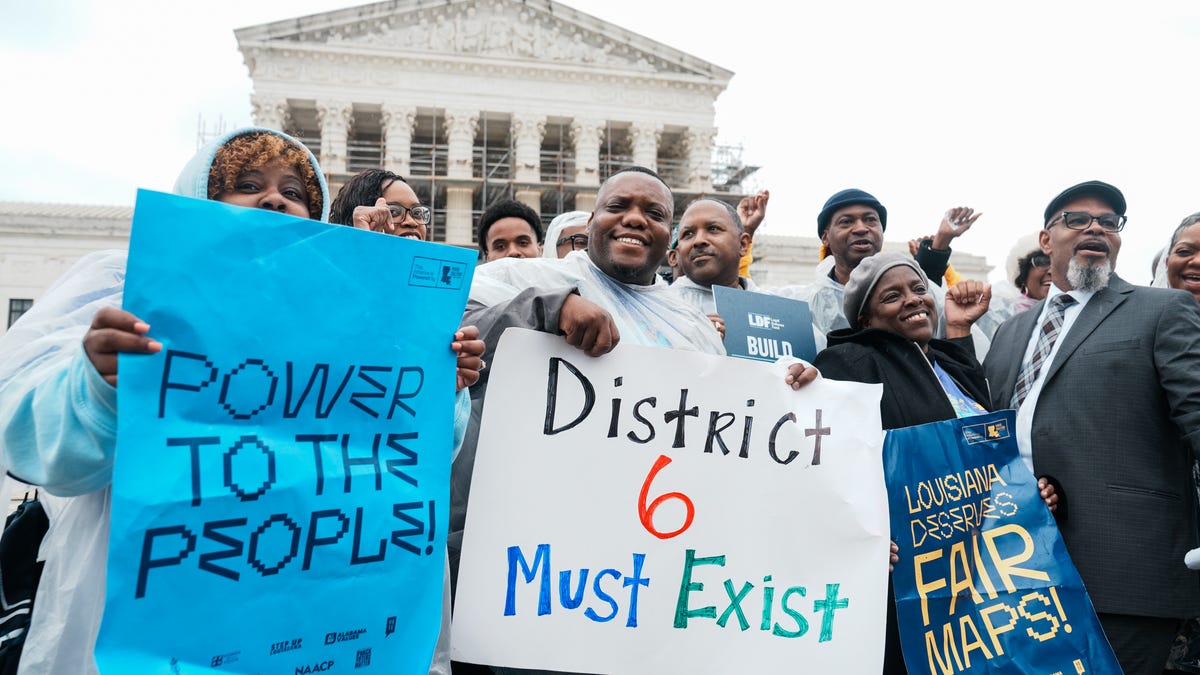 People gather outside of the U.S. Supreme Court following arguments heard in Louisiana v. Callais on March 24, 2025. The Supreme Court on June 27 deferred a decision on the constitutionality of Louisiana’s congressional map, saying they want to reconsider the case after additional oral arguments which it will schedule later. The map is being challenged by non-Black voters who said it relied too heavily on race to sort voters.
