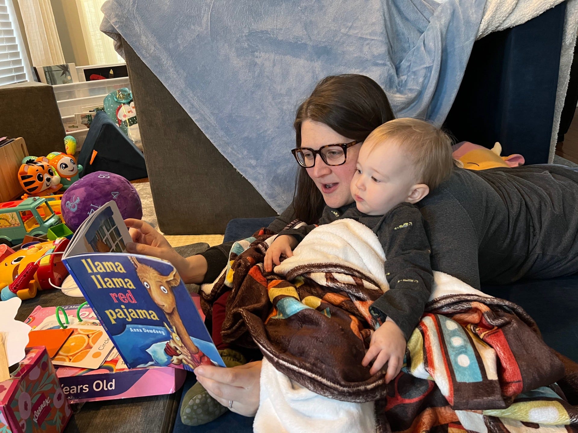 Erin Ryan reads to her daughter.