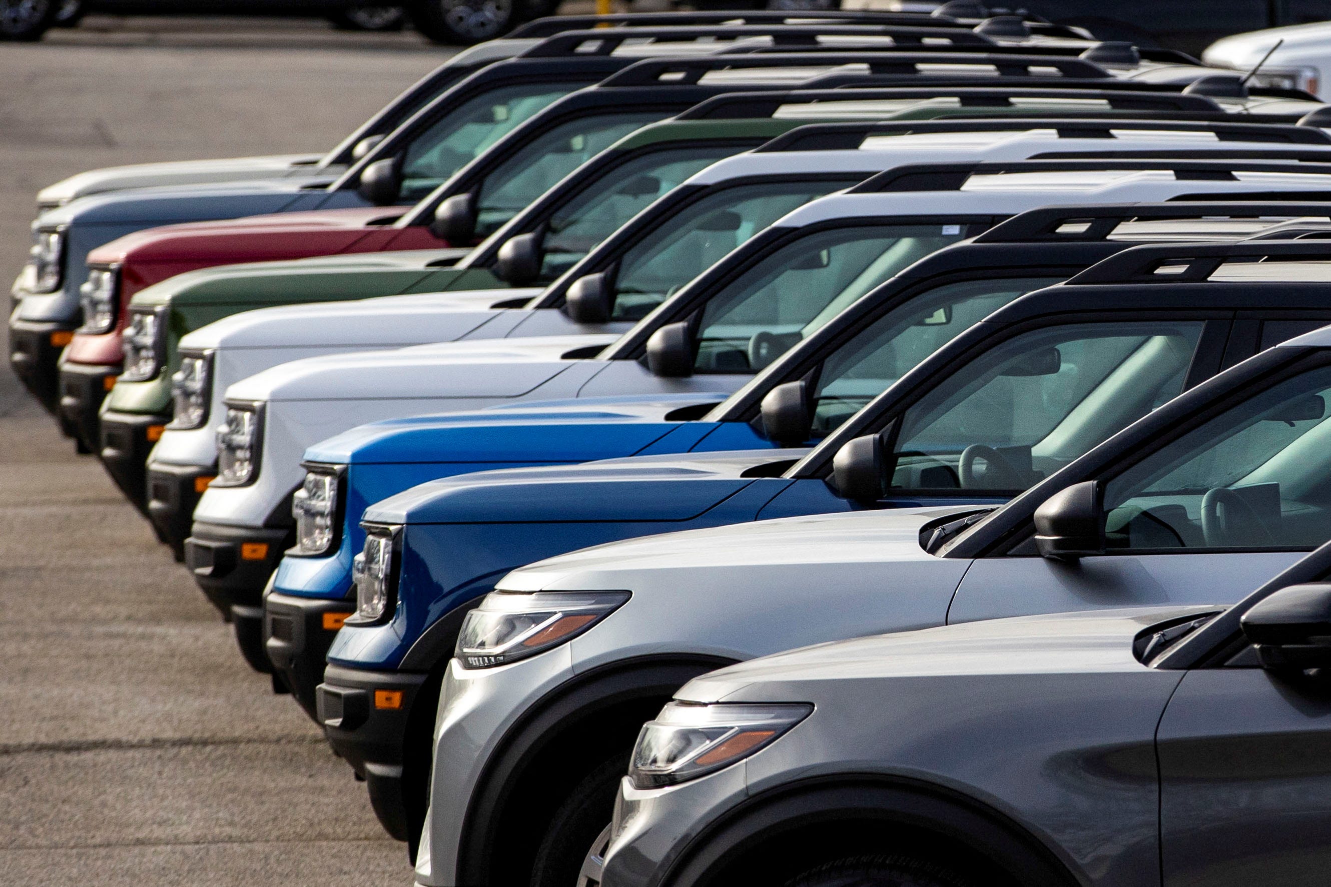 Ford vehicles parked for sale at a car dealership in Oakville, Ontario, Canada, March 13, 2025.