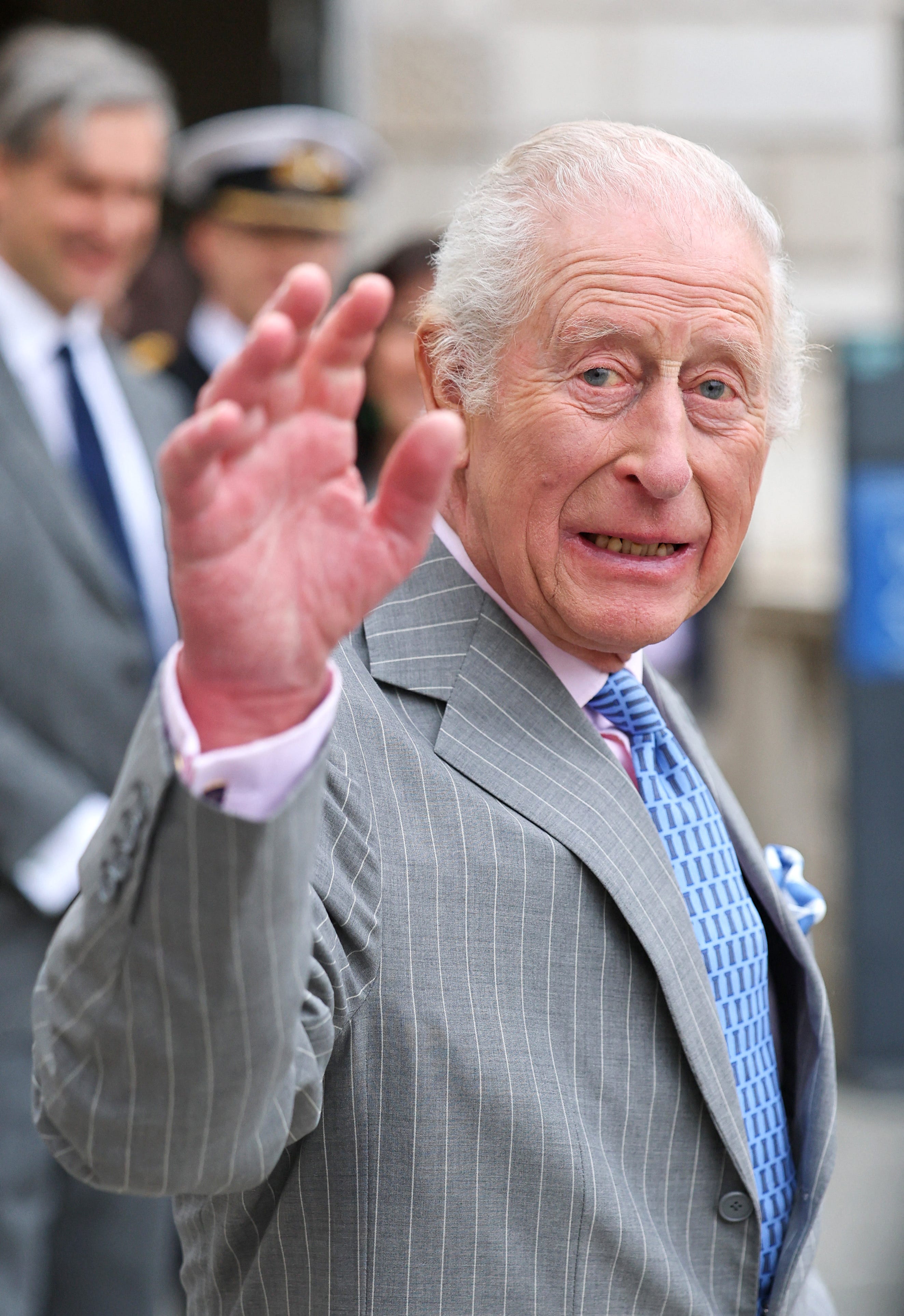 King Charles III waves during a visit of the exhibition "Soil: The World at Our Feet" at Somerset House in central London, on March 26, 2025.