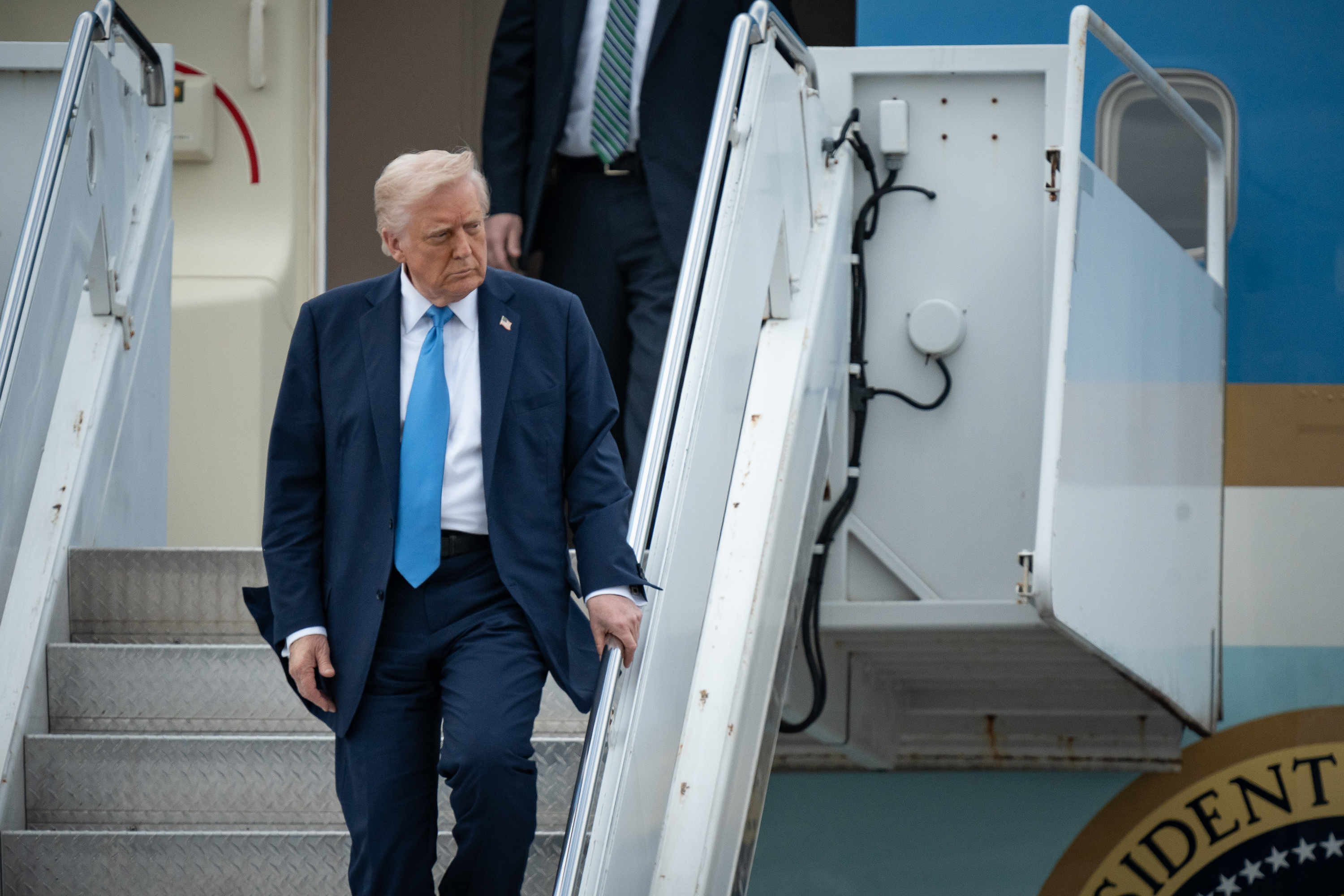 President Donald Trump arrives at Palm Beach, Fla., on March 28, 2025.
