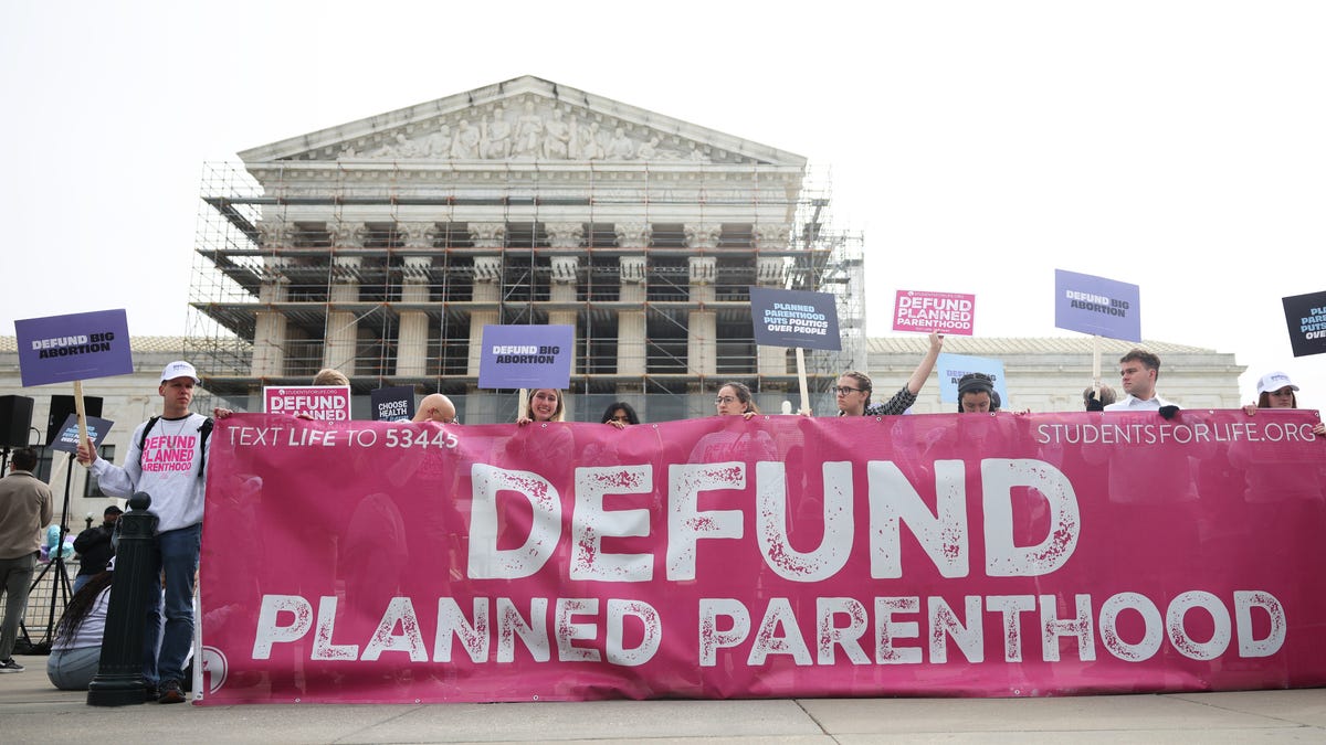 WASHINGTON, DC - APRIL 02: Anti-abortion protestors gather outside the U.S. Supreme Court as oral arguments are delivered in the case of Medina v. Planned Parenthood South Atlantic on April 2, 2025 in Washington D.C. The case details an attempt by the state of South Carolina to exclude Planned Parenthood from its Medicaid program because it provides abortions. (Photo by Kayla Bartkowski/Getty Images)