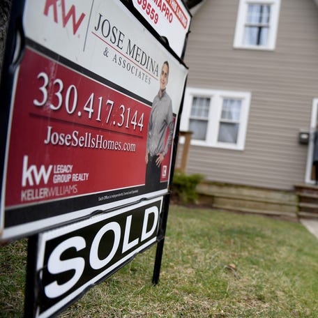 John Hunt does a final walk through of his new North Canton home with realtor Tiffany Pepper with Keller Williams Legacy Group before signing the final papers. Wednesday, January, 11, 2023.