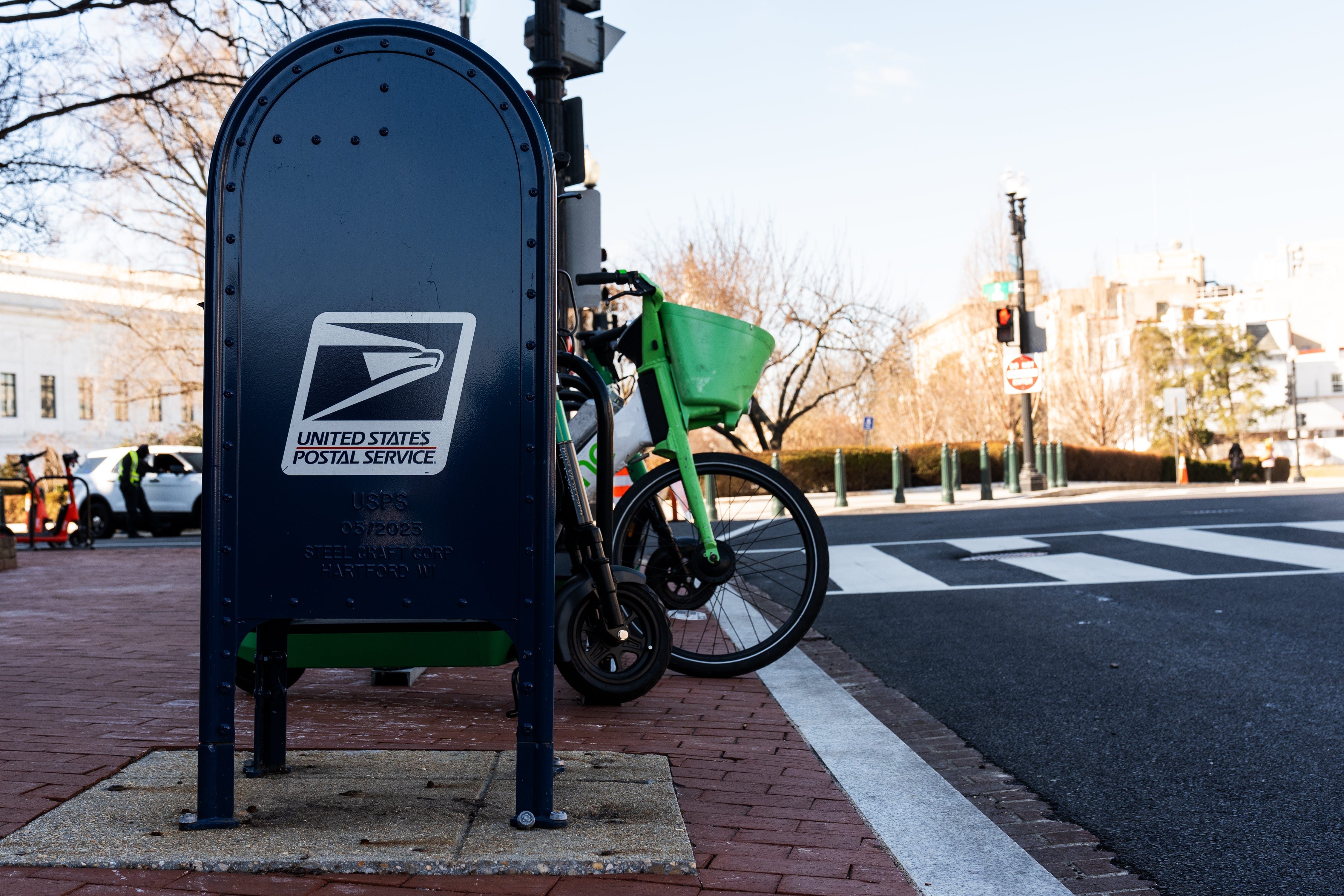 The U.S. Postal Service drop-off box is visible in the Capitol Hill neighborhood in Washington.
