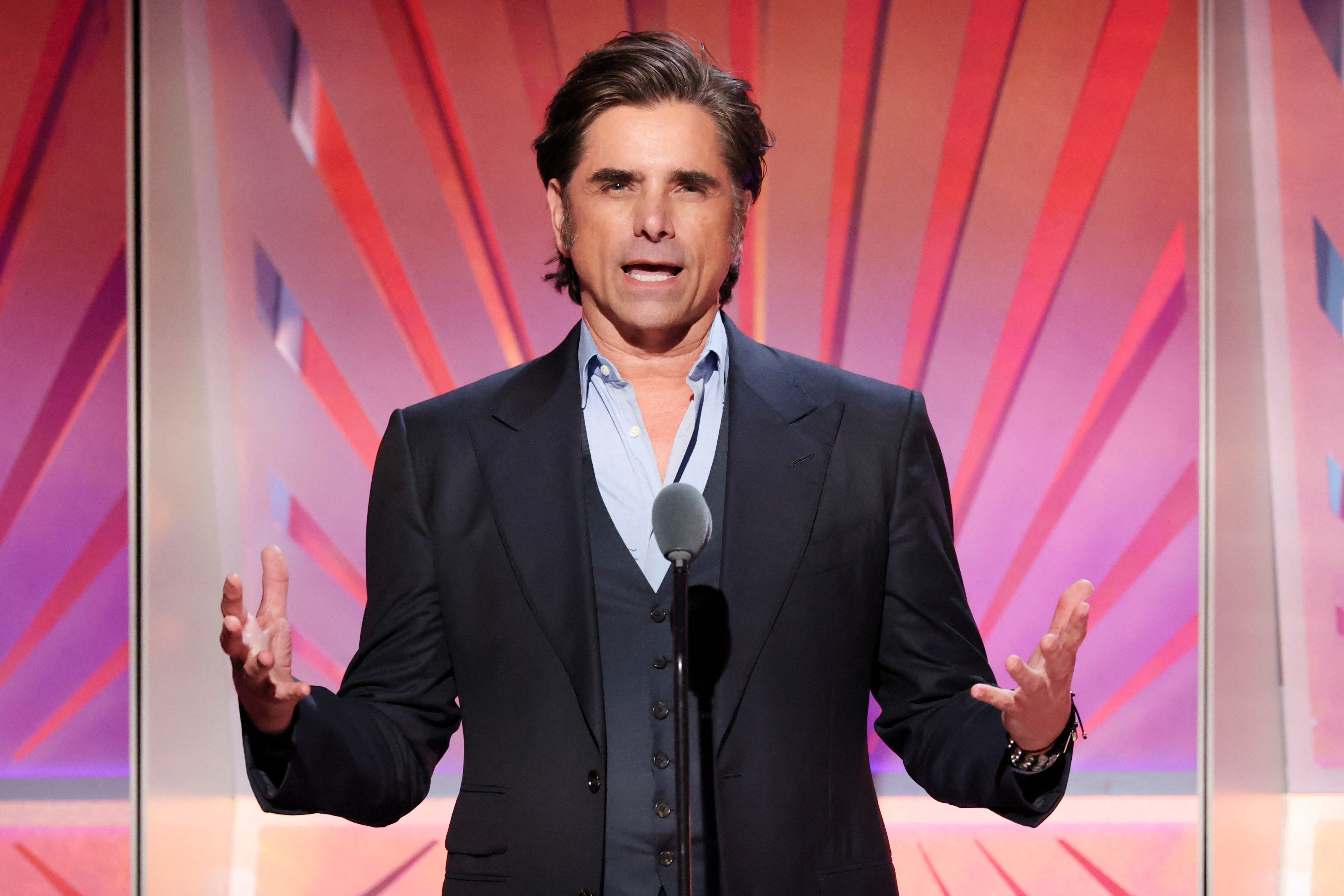 John Stamos appears onstage during the AARP The Magazine's Annual Movies for Grownups Awards in Beverly Hills, California on Feb. 8, 2025.