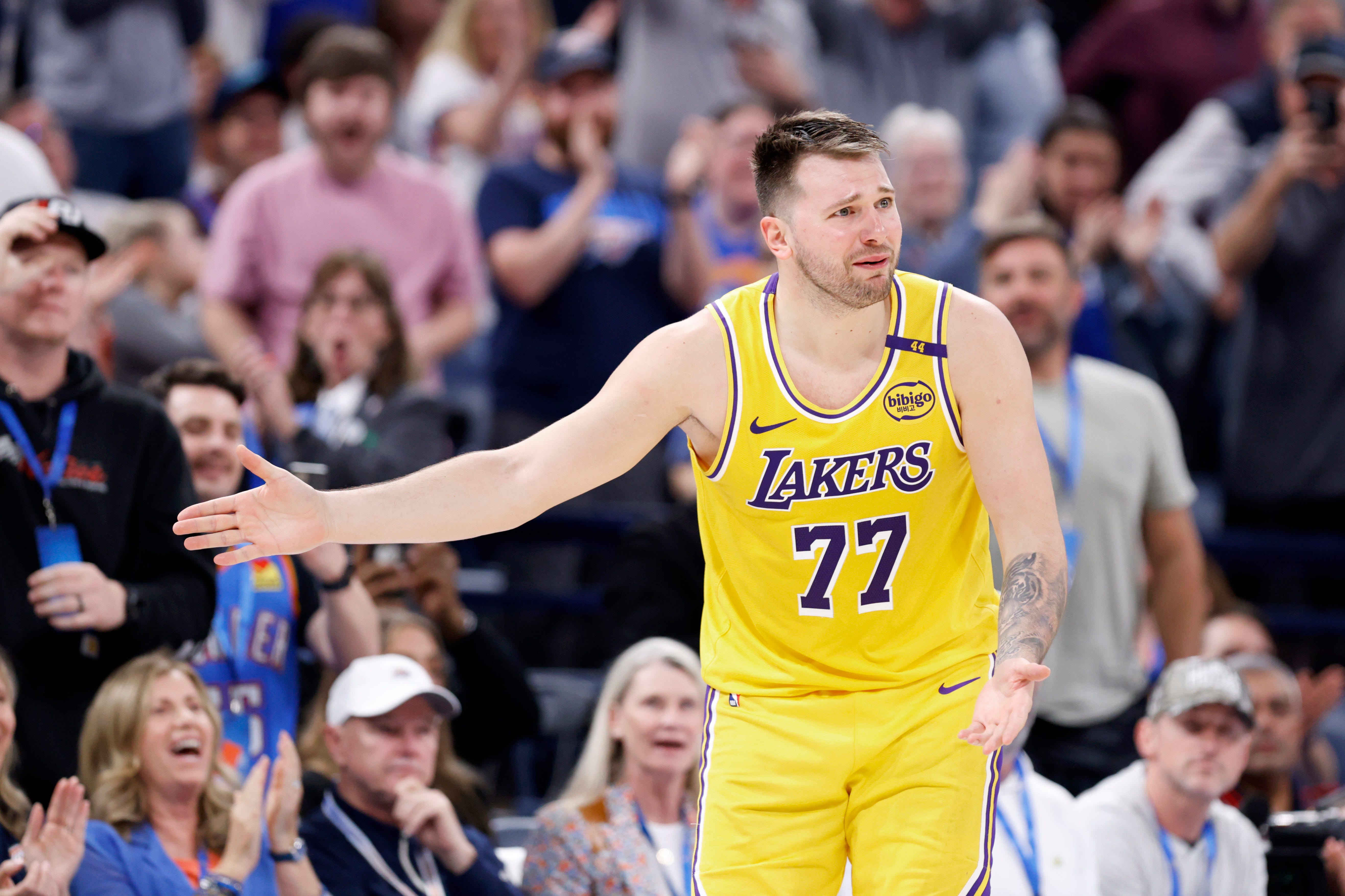 Los Angeles Lakers guard Luka Doncic (77) reacts after getting ejected during an NBA basketball game between the Oklahoma City Thunder and the Los Angeles Lakers at Paycom Center in Oklahoma City, Tuesday, April 8, 2025.