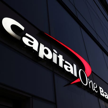 Signage is seen outside a Capital One Bank in Manhattan, New York, U.S., November 12, 2021.