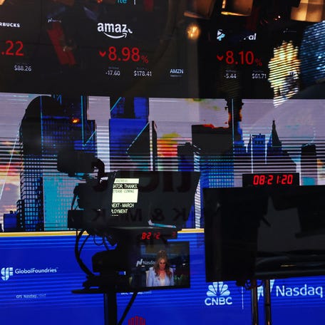 Market data is displayed on a screen inside the Nasdaq market site at Times Square in New York City, U.S., April 4, 2025.