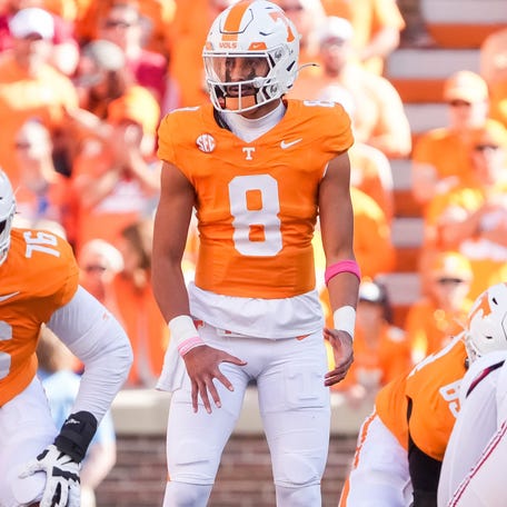 Tennessee quarterback Nico Iamaleava (8) stands at the line of scrimmage before a play agianst Alabama at Neyland Stadium on Saturday, Oct. 19, 2024.