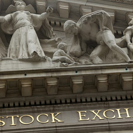 FILE PHOTO: The New York Stock Exchange (NYSE) in New York City, U.S., February 24, 2022. REUTERS/Caitlin Ochs/File Photo