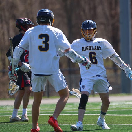 Highland's, from left, Luke Wiese and Trevor Coates celebrate a goal scored by Coates during Thursday's game versus Red Hook on April 17, 2025.