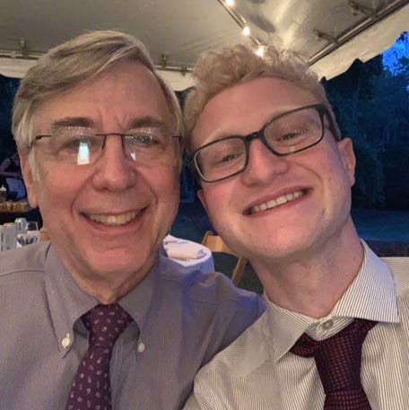 Mark Oliver (left) with his son David Oliver (right).