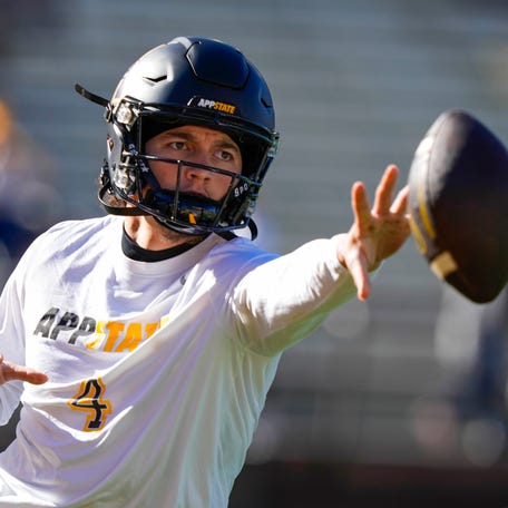 Sep 23, 2023; Laramie, Wyoming, USA; Appalachian State Mountaineers quarterback Joey Aguilar (4) warms up before game against the Wyoming Cowboys at Jonah Field at War Memorial Stadium. Mandatory Credit: Troy Babbitt-USA TODAY Sports