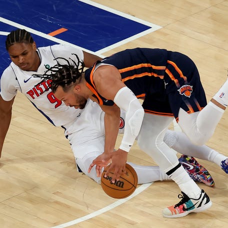 Apr 21, 2025; New York, New York, USA; New York Knicks guard Jalen Brunson (11) is fouled by Detroit Pistons forward Ausar Thompson (9) as he drives to the basket during the first quarter of game two of first round of the 2024 NBA Playoffs at Madison Square Garden. Mandatory Credit: Brad Penner-Imagn Images