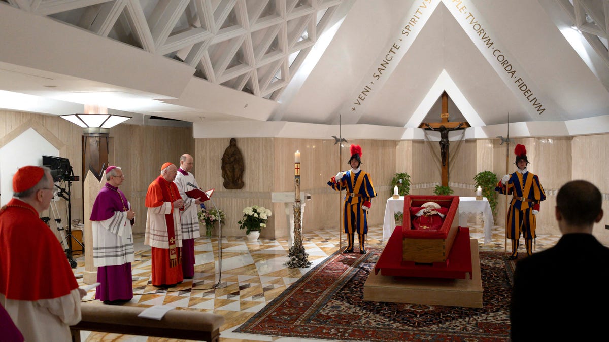 The body of Pope Francis is placed in an open casket Monday during the rite of the declaration of death in Santa Marta residence at the Vatican.