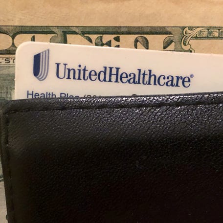 A UnitedHealth Group health insurance card is seen in a wallet in this picture illustration October 14, 2019.