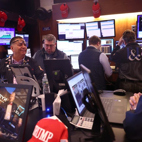 NEW YORK, NEW YORK - JANUARY 22: Traders work on the floor of the New York Stock Exchange during morning trading on January 22, 2025 in New York City. Stocks continued an upward swing opening up high a day after the Dow Jones closed up 500 points and the S&P 500 approaching an all-time high. The rise comes after OpenAI CEO Sam Altman, SoftBank CEO Masayoshi Son and Oracle Chairman Larry Ellison made an announcement alongside President Donald Trump that they will create a new company, called   Stargate, to grow artificial intelligence infrastructure in the U.S. (Photo by Michael M. Santiago/Getty Images)