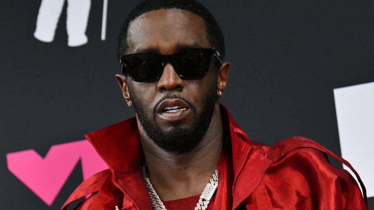 Sean "Diddy" Combs poses with the Global Icon award in the press room during the MTV Video Music Awards at the Prudential Center in Newark, New Jersey, on Sept. 12, 2023.